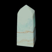 Pistachio Calcite obelisk 68*28*24mm 92g in sunlight - Rocks and Things Store