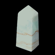Pistachio Calcite obelisk 68*28*24mm 92g in sunlight - Rocks and Things Store