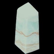 Pistachio Calcite obelisk 68*28*24mm 92g in sunlight - Rocks and Things Store