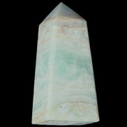 Pistachio Calcite obelisk 72*35*24mm 110g in sunlight - Rocks and Things Store