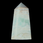 Pistachio Calcite obelisk 72*35*24mm 110g in sunlight - Rocks and Things Store