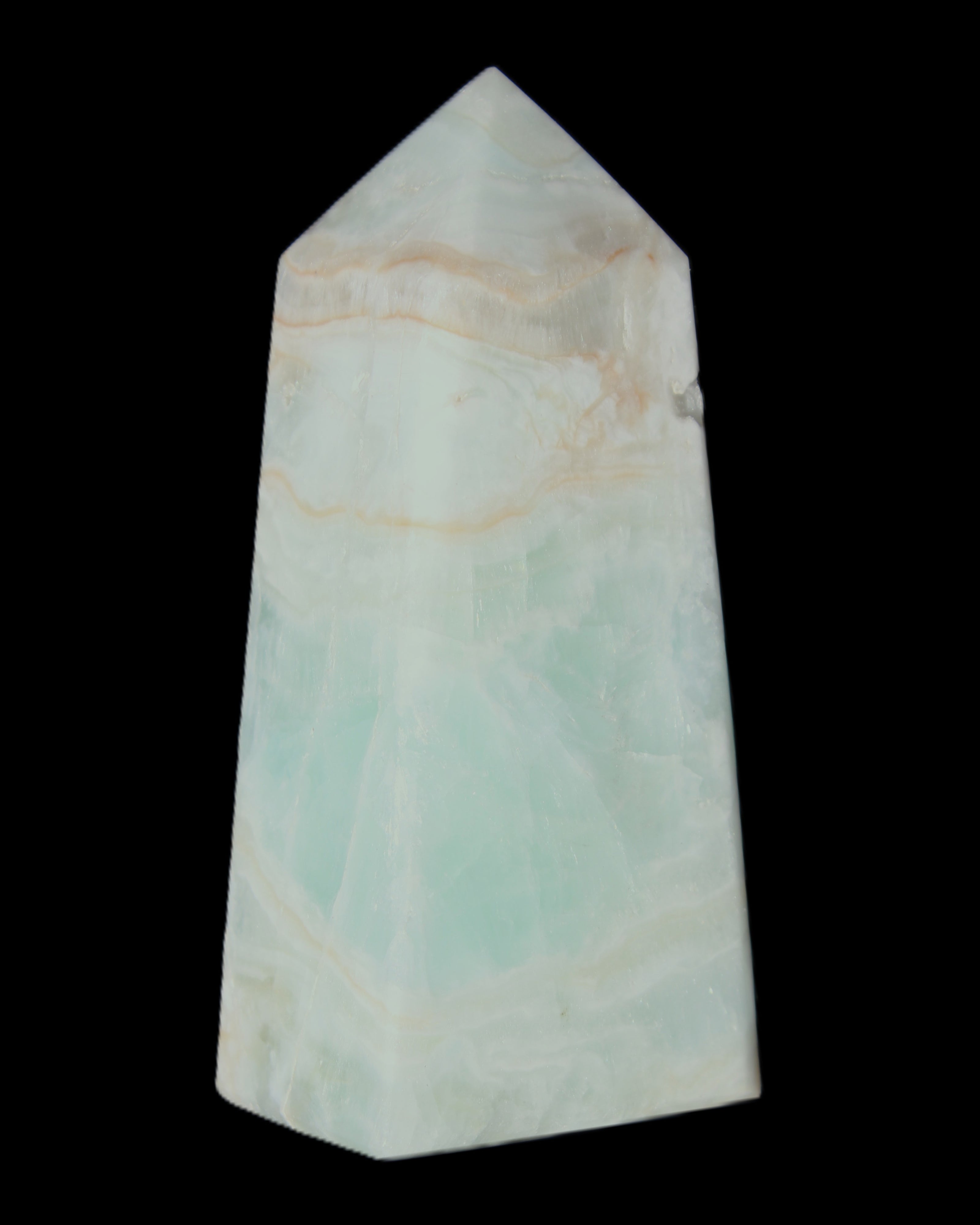 Pistachio Calcite obelisk 72*35*24mm 110g in sunlight - Rocks and Things Store