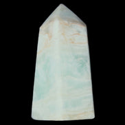 Pistachio Calcite obelisk 72*35*24mm 110g in sunlight - Rocks and Things Store