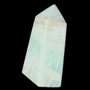 Pistachio Calcite obelisk 72*35*24mm 110g in sunlight - Rocks and Things Store
