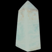 Pistachio Calcite obelisk 72*35*24mm 110g in sunlight - Rocks and Things Store