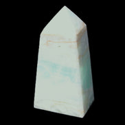 Pistachio Calcite obelisk 72*35*24mm 110g in sunlight - Rocks and Things Store