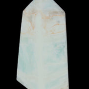 Pistachio Calcite obelisk 72*35*24mm 110g in sunlight - Rocks and Things Store