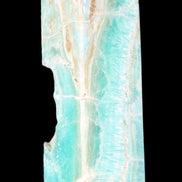 Blue Aragonite obelisk 134*42*35mm 440g in sunlight - Rocks and Things Store