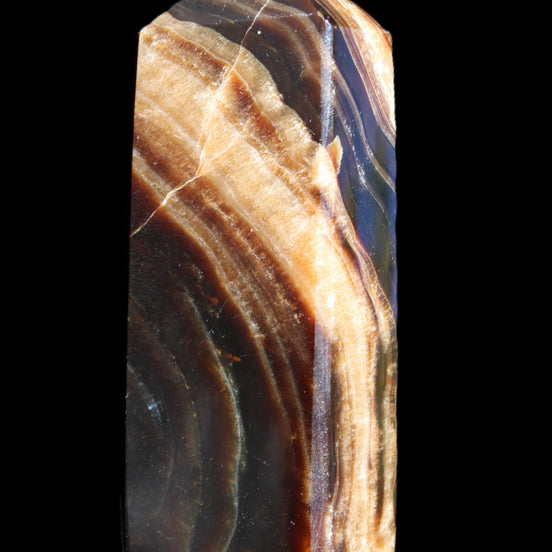 Chocolate Calcite obelisk 95*31*23mm 172g in sunlight - Rocks and Things Store