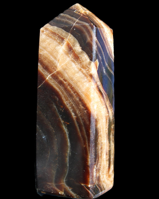 Chocolate Calcite obelisk 95*31*23mm 172g in sunlight - Rocks and Things Store