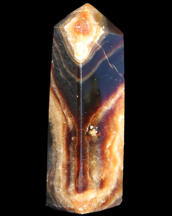 Chocolate Calcite obelisk 95*31*23mm 172g in sunlight - Rocks and Things Store