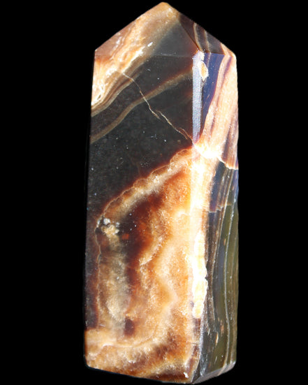 Chocolate Calcite obelisk 95*31*23mm 172g in sunlight - Rocks and Things Store