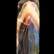 Chocolate Calcite obelisk 95*31*23mm 172g in sunlight - Rocks and Things Store