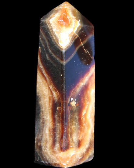 Chocolate Calcite obelisk 95*31*23mm 172g in sunlight - Rocks and Things Store