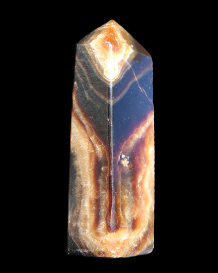 Chocolate Calcite obelisk 95*31*23mm 172g in sunlight - Rocks and Things Store