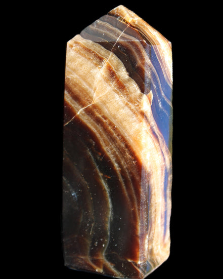 Chocolate Calcite obelisk 95*31*23mm 172g in sunlight - Rocks and Things Store