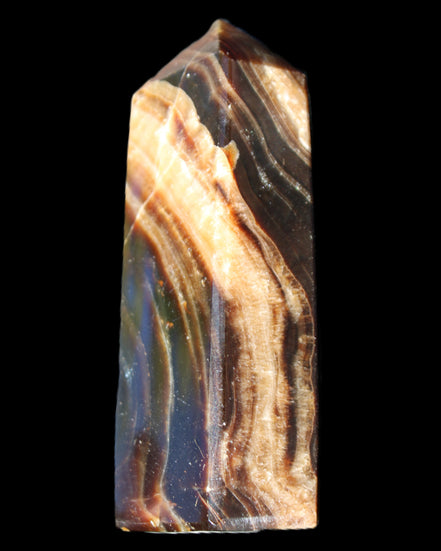 Chocolate Calcite obelisk 95*31*23mm 172g in sunlight - Rocks and Things Store