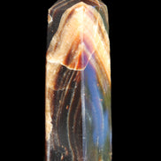 Chocolate Calcite obelisk 95*31*23mm 172g in sunlight - Rocks and Things Store