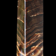 Chocolate Calcite obelisk 114*33*26mm 249g in sunlight - Rocks and Things Store