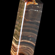 Chocolate Calcite obelisk 114*33*26mm 249g in sunlight - Rocks and Things Store