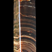 Chocolate Calcite obelisk 114*33*26mm 249g in sunlight - Rocks and Things Store