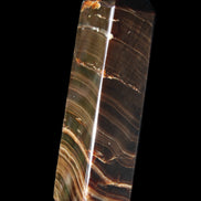 Chocolate Calcite obelisk 114*33*26mm 249g in sunlight - Rocks and Things Store