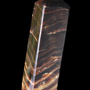 Chocolate Calcite obelisk 114*33*26mm 249g in sunlight - Rocks and Things Store
