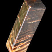 Chocolate Calcite obelisk 114*33*26mm 249g in sunlight - Rocks and Things Store