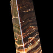Chocolate Calcite obelisk 114*33*26mm 249g in sunlight - Rocks and Things Store