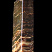 Chocolate Calcite obelisk 114*33*26mm 249g in sunlight - Rocks and Things Store