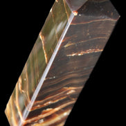 Chocolate Calcite obelisk 114*33*26mm 249g in sunlight - Rocks and Things Store