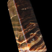 Chocolate Calcite obelisk 114*33*26mm 249g in sunlight - Rocks and Things Store
