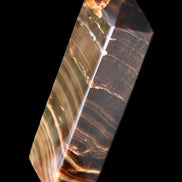 Chocolate Calcite obelisk 114*33*26mm 249g in sunlight - Rocks and Things Store