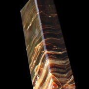 Chocolate Calcite obelisk 114*33*26mm 249g in sunlight - Rocks and Things Store