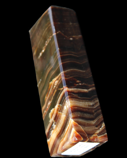 Chocolate Calcite obelisk 114*33*26mm 249g in sunlight - Rocks and Things Store