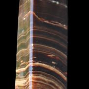 Chocolate Calcite obelisk 114*33*26mm 249g in sunlight - Rocks and Things Store