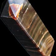 Chocolate Calcite obelisk 114*33*26mm 249g in sunlight - Rocks and Things Store