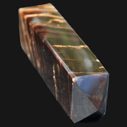 Chocolate Calcite obelisk 114*33*26mm 249g in sunlight - Rocks and Things Store