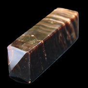 Chocolate Calcite obelisk 114*33*26mm 249g in sunlight - Rocks and Things Store