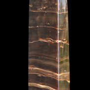 Chocolate Calcite obelisk 110*30*24mm 214g in sunlight - Rocks and Things Store