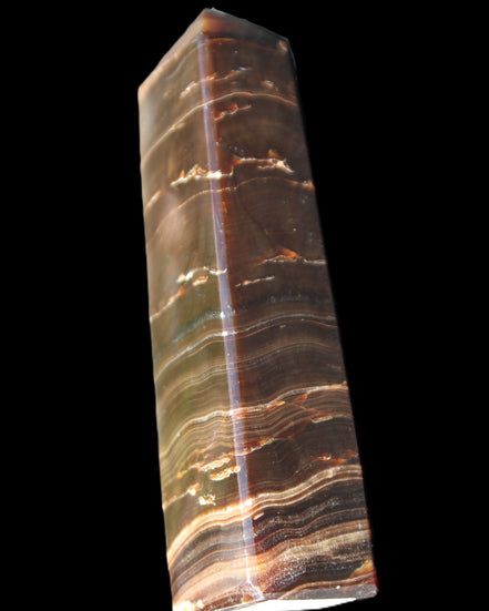 Chocolate Calcite obelisk 110*30*24mm 214g in sunlight - Rocks and Things Store