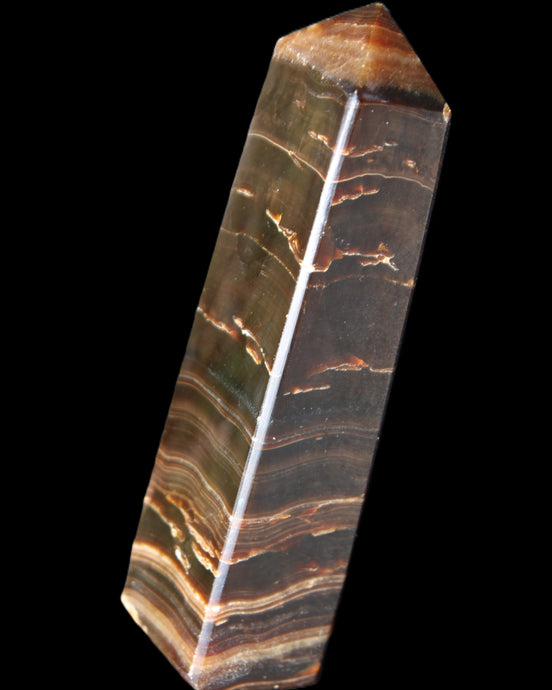 Chocolate Calcite obelisk 110*30*24mm 214g in sunlight - Rocks and Things Store