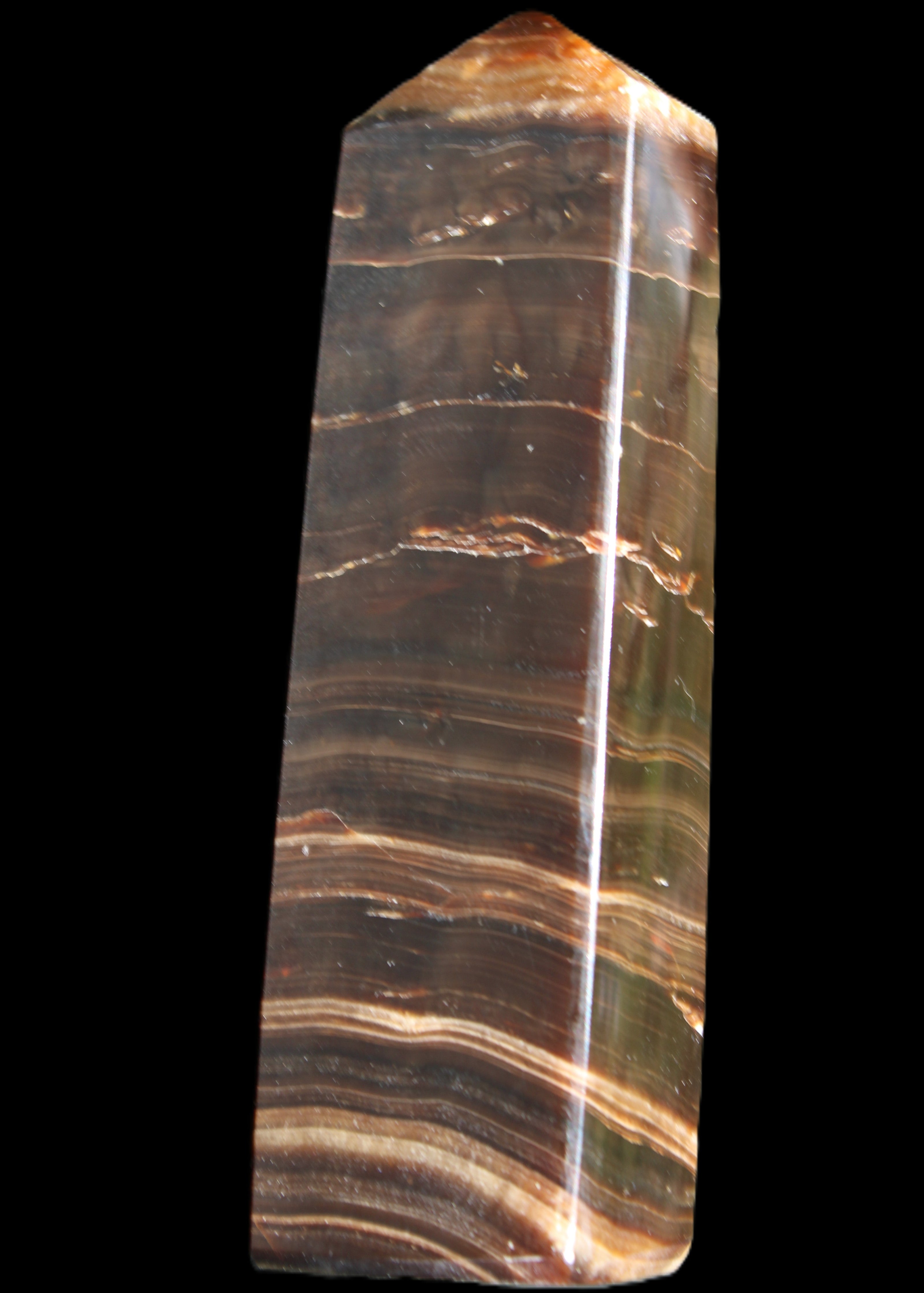 Chocolate Calcite obelisk 110*30*24mm 214g in sunlight - Rocks and Things Store
