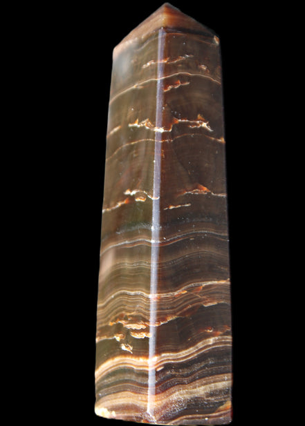 Chocolate Calcite obelisk 110*30*24mm 214g in sunlight - Rocks and Things Store