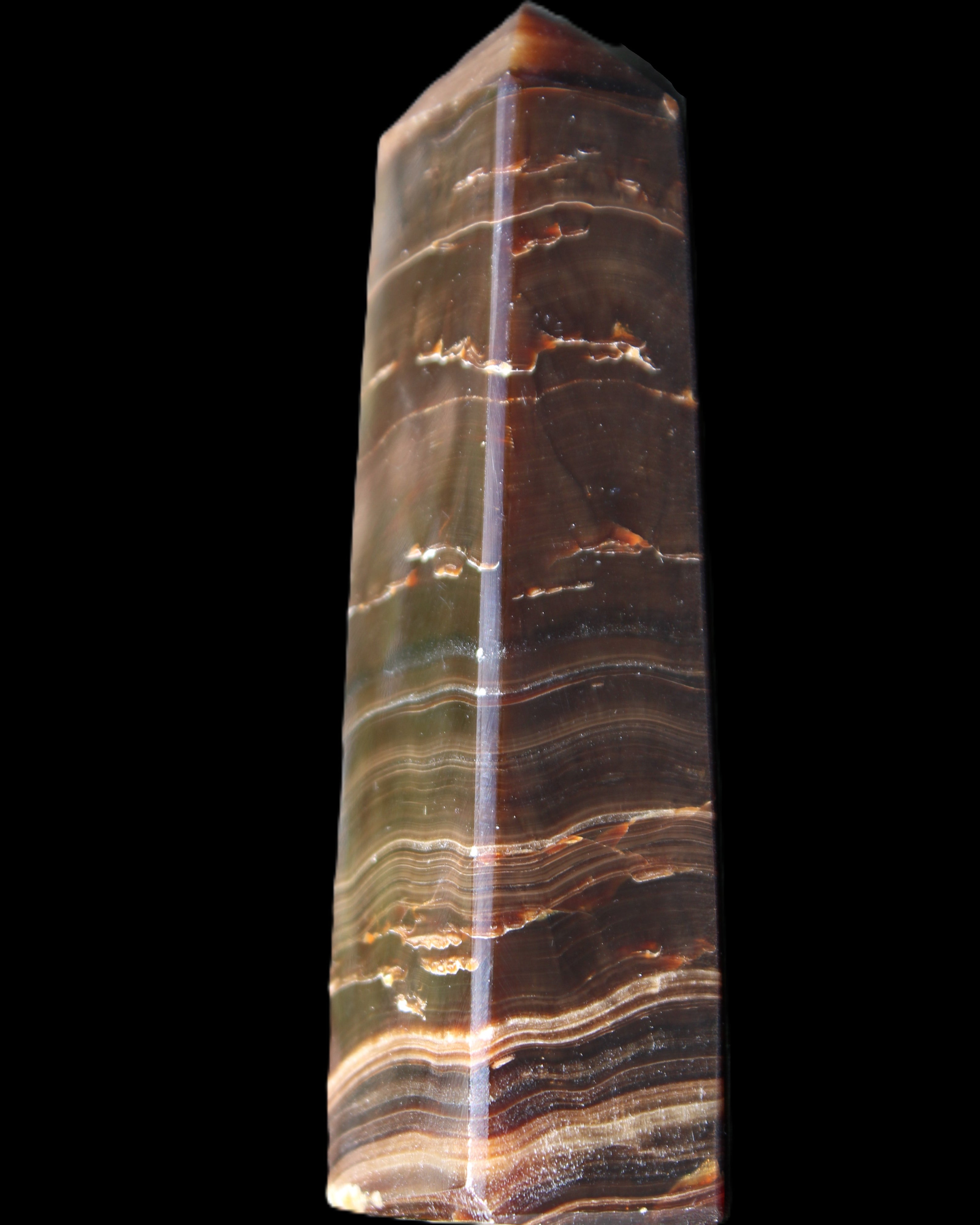 Chocolate Calcite obelisk 110*30*24mm 214g in sunlight - Rocks and Things Store