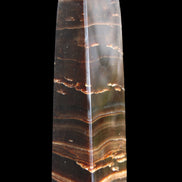 Chocolate Calcite obelisk 110*30*24mm 214g in sunlight - Rocks and Things Store