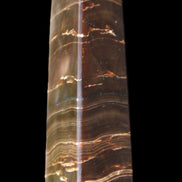 Chocolate Calcite obelisk 110*30*24mm 214g in sunlight - Rocks and Things Store