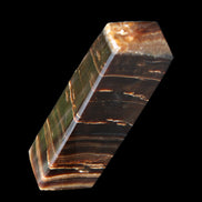 Chocolate Calcite obelisk 110*30*24mm 214g in sunlight - Rocks and Things Store