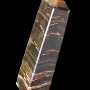 Chocolate Calcite obelisk 110*30*24mm 214g in sunlight - Rocks and Things Store