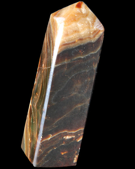 Chocolate Calcite obelisk 118*33*28mm 236g in sunlight - Rocks and Things Store